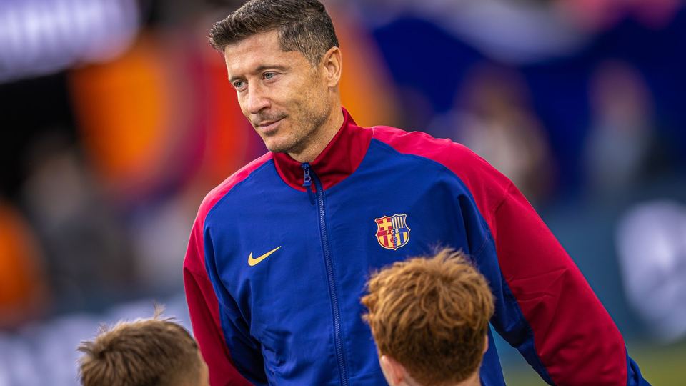 Robert Lewandowski greeting young fans