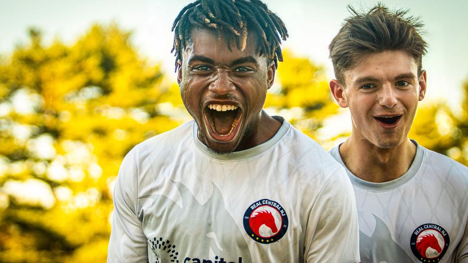 Two Real Central NJ players celebrating a goal
